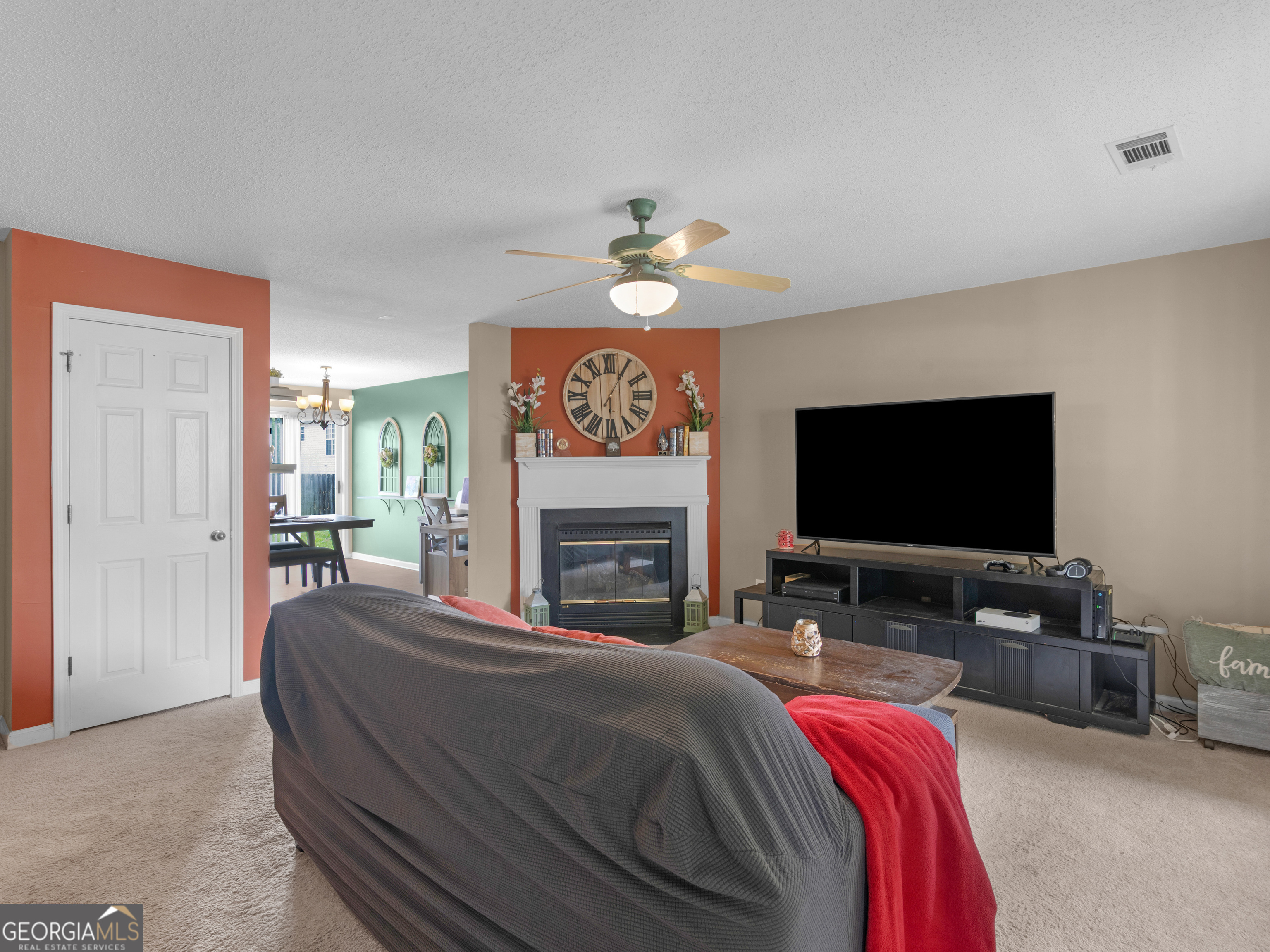 3370 Waggoner Place Rex, GA 30273 - Photo 4 of 25 a spacious bedroom with a bed and a flat screen tv