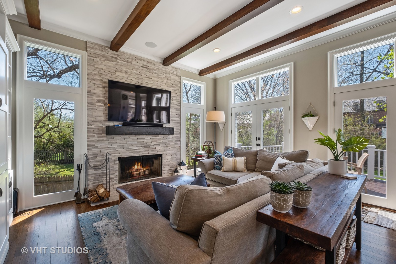 254 Ridge Avenue Winnetka, IL 60093 - Photo 12 of 34 a living room with furniture fireplace and potted plants
