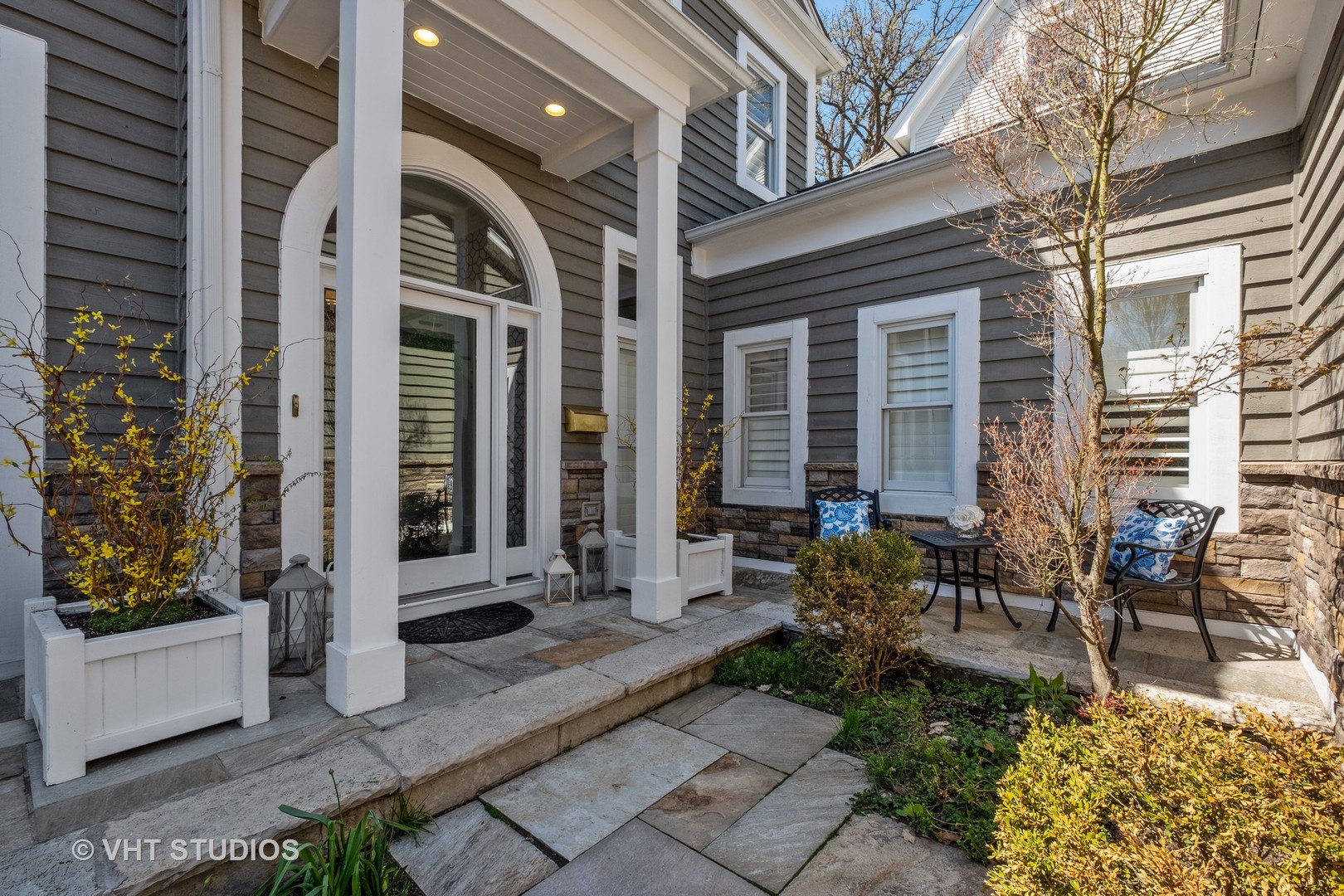 254 Ridge Avenue Winnetka, IL 60093 - Photo 3 of 34 a front view of a house with outdoor seating