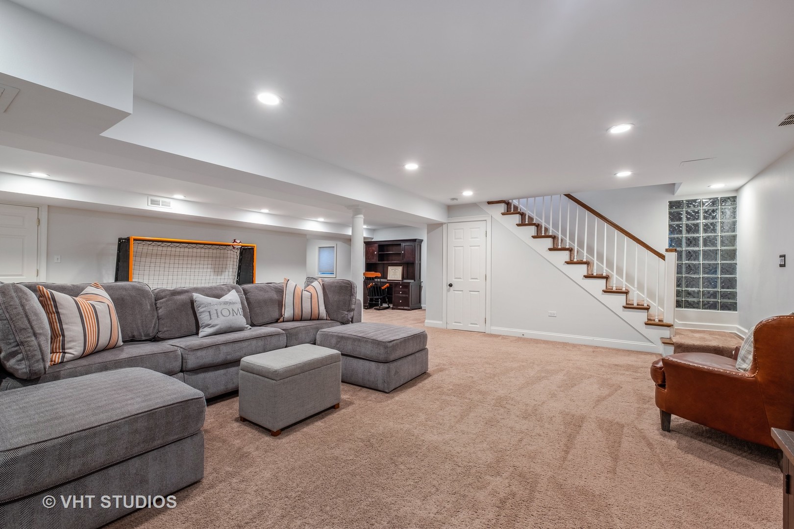 254 Ridge Avenue Winnetka, IL 60093 - Photo 30 of 34 a living room with furniture and stairs