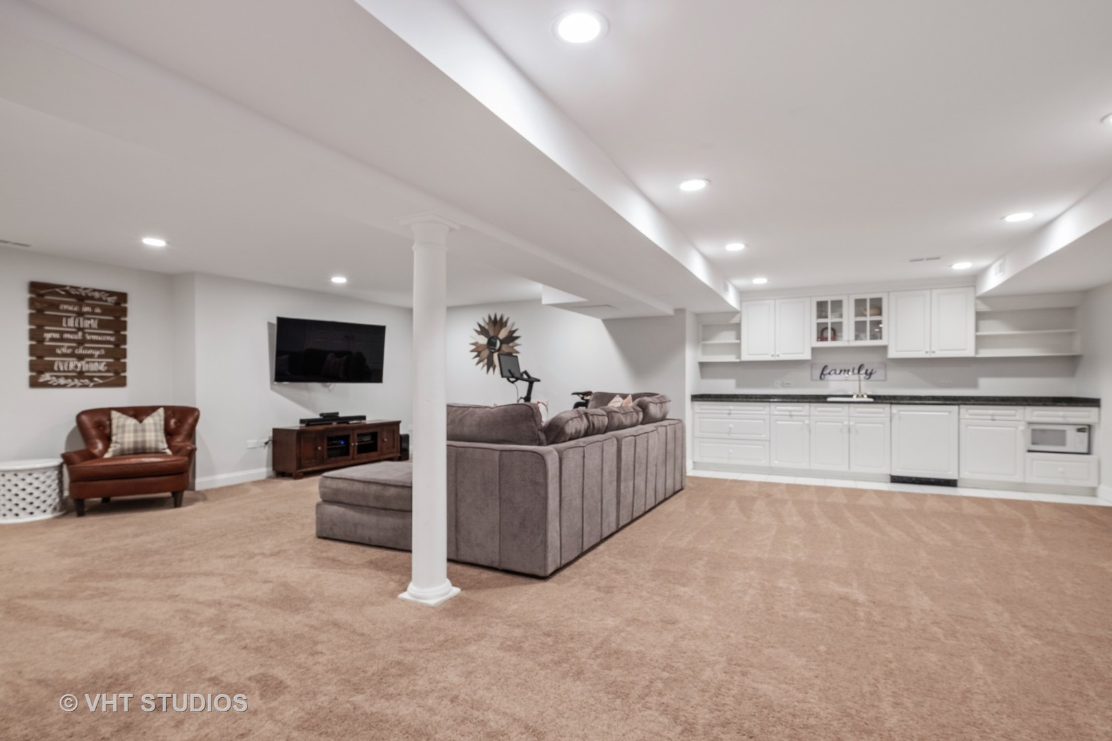 254 Ridge Avenue Winnetka, IL 60093 - Photo 31 of 34 a living room with furniture and a flat screen tv