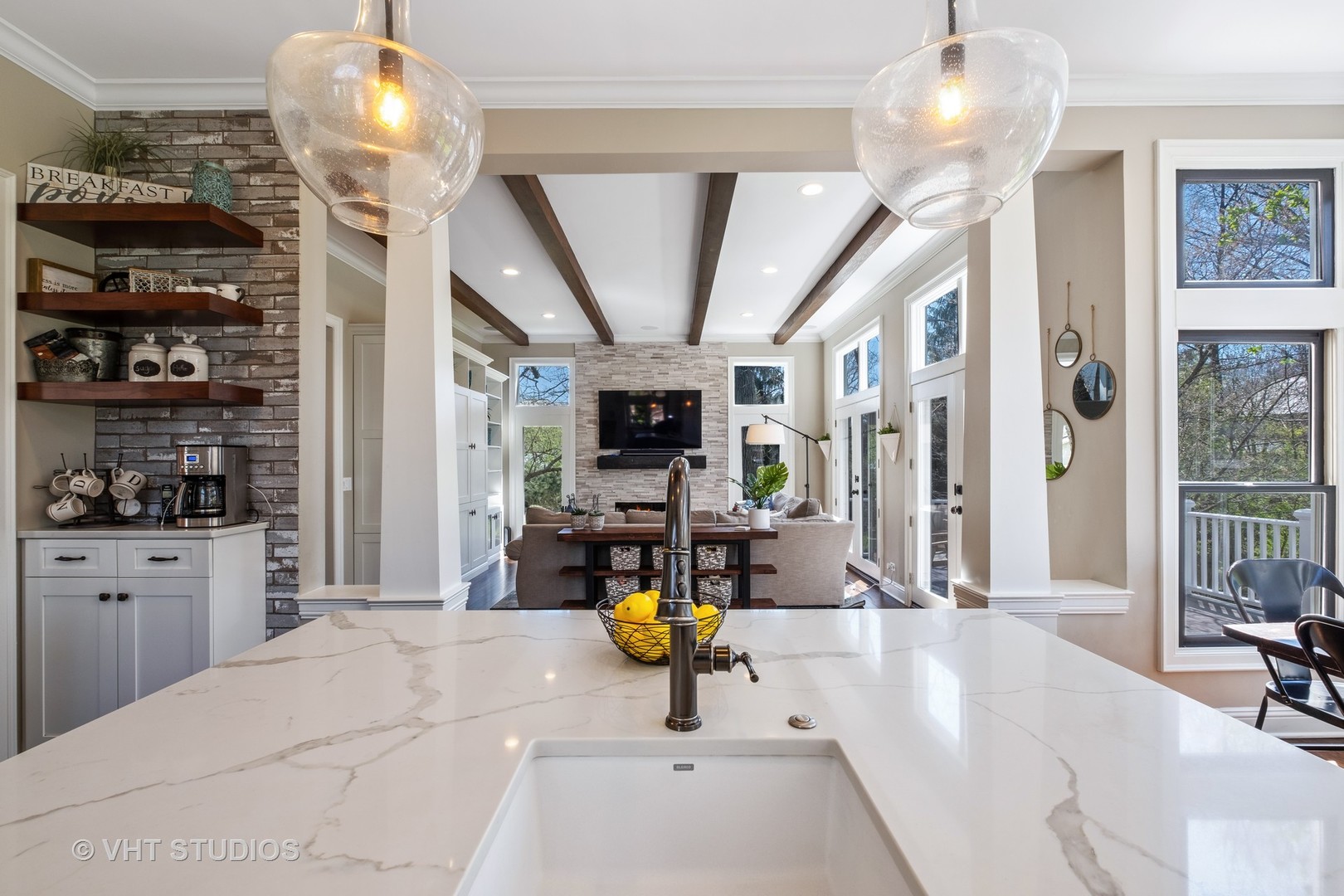 254 Ridge Avenue Winnetka, IL 60093 - Photo 9 of 34 a living room with stainless steel appliances furniture and a chandelier