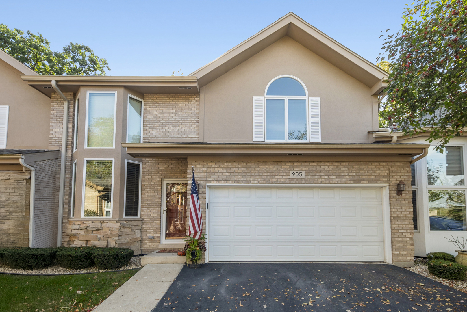 9051 Archer Avenue Willow Springs, IL 60480 - Photo 1 of 30 a front view of a house with a yard
