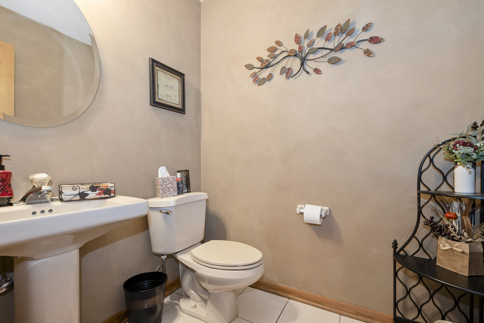 9051 Archer Avenue Willow Springs, IL 60480 - Photo 14 of 30 a bathroom with a sink mirror and toilet