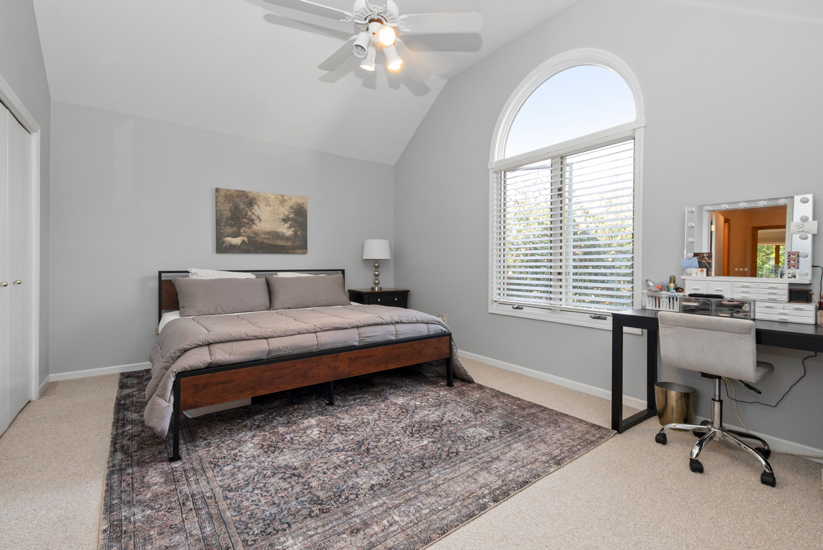 9051 Archer Avenue Willow Springs, IL 60480 - Photo 16 of 30 a bedroom with a bed and a chandelier