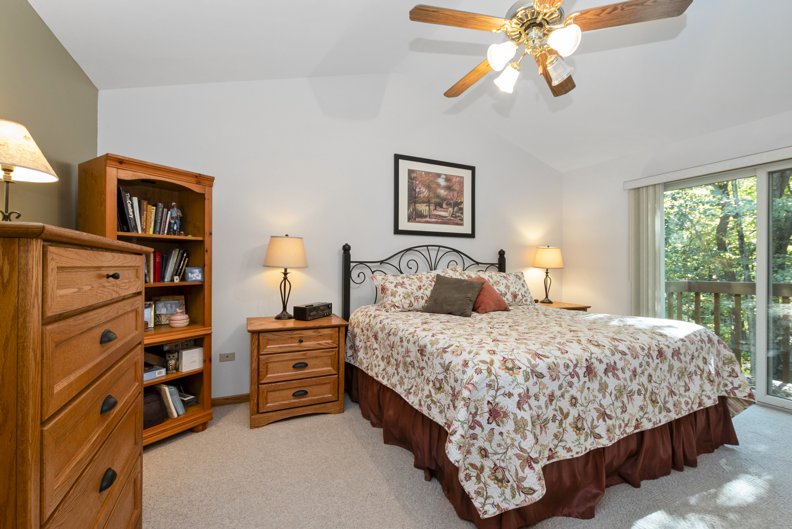 9051 Archer Avenue Willow Springs, IL 60480 - Photo 19 of 30 a bedroom with a bed and a chandelier