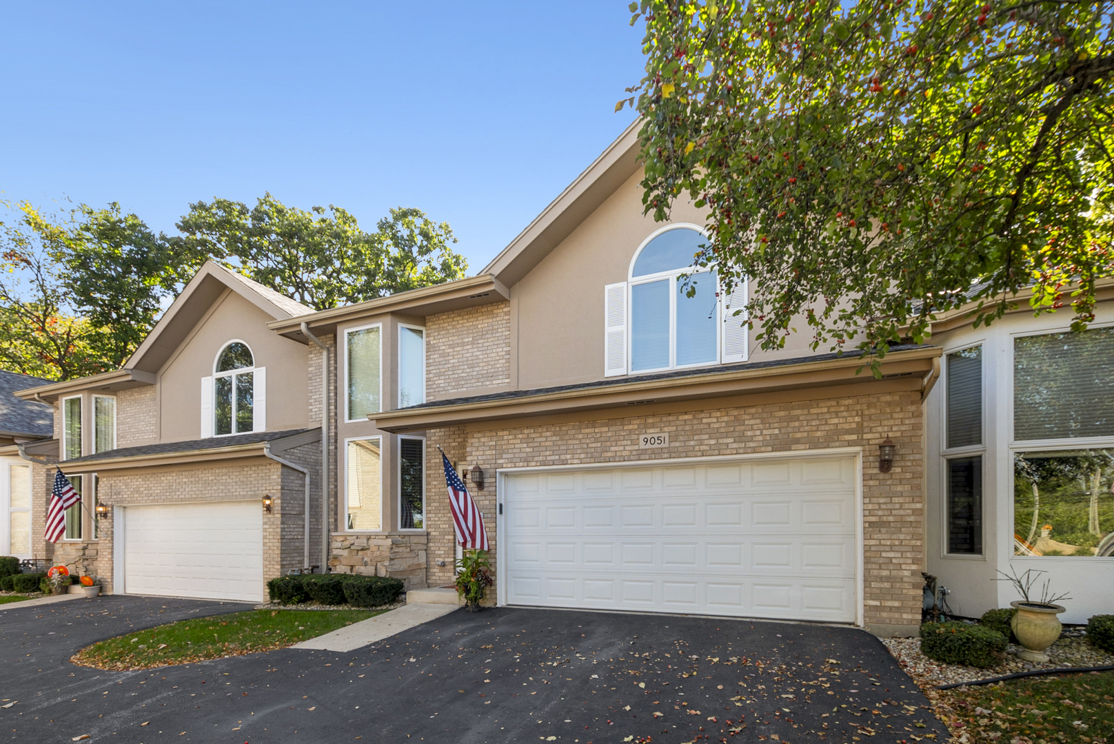 9051 Archer Avenue Willow Springs, IL 60480 - Photo 2 of 30 a view of a white house with a outdoor space