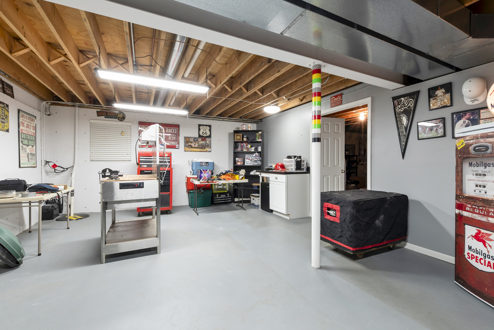 9051 Archer Avenue Willow Springs, IL 60480 - Photo 24 of 30 a living room with furniture and a flat screen tv