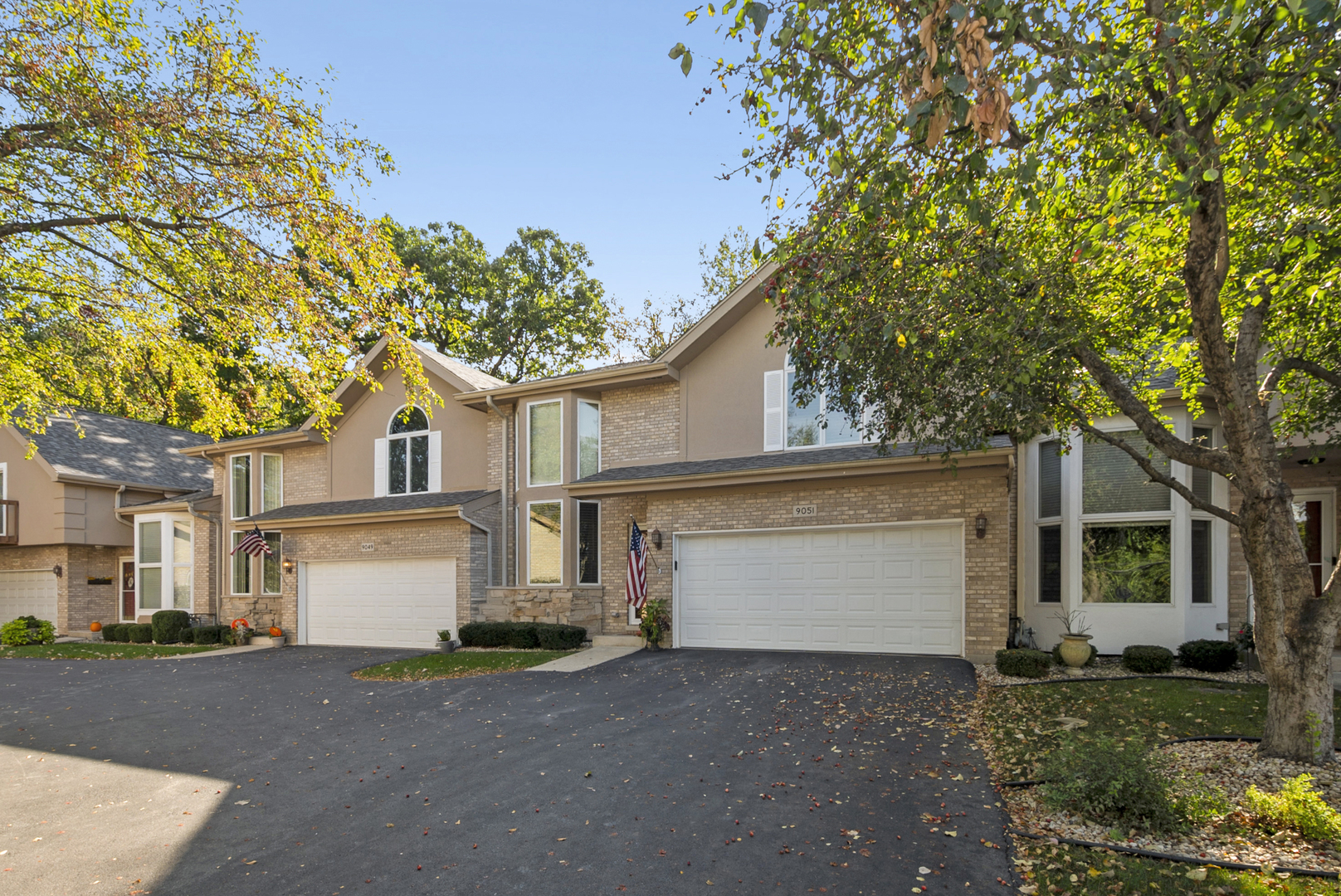 9051 Archer Avenue Willow Springs, IL 60480 - Photo 4 of 30 a view of a house with a yard and garage