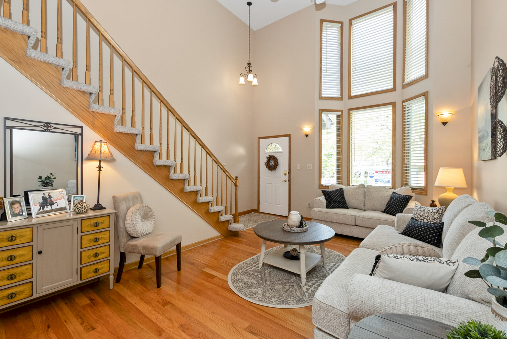 9051 Archer Avenue Willow Springs, IL 60480 - Photo 7 of 30 a living room with furniture a fireplace and a large window