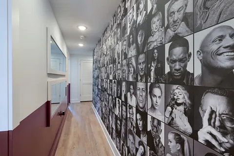a bedroom with a bed and a window with the outer view