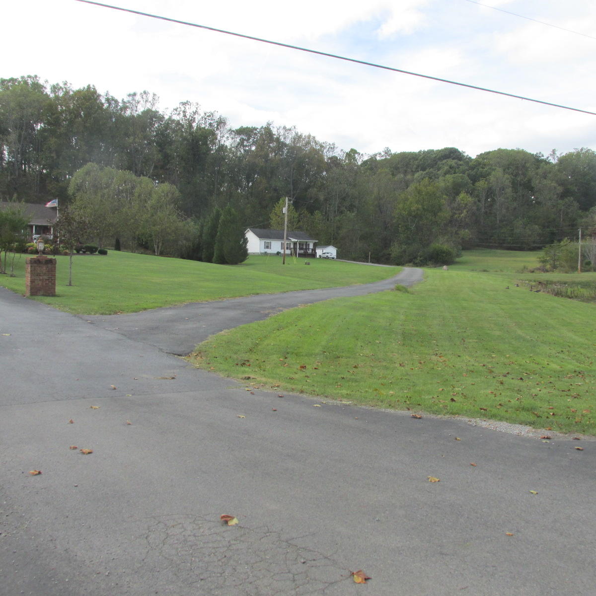 2643 Rutrough Road Southeast Roanoke, VA 24014 - Photo 2 of 32 a view of a outdoor space with green field and mountains