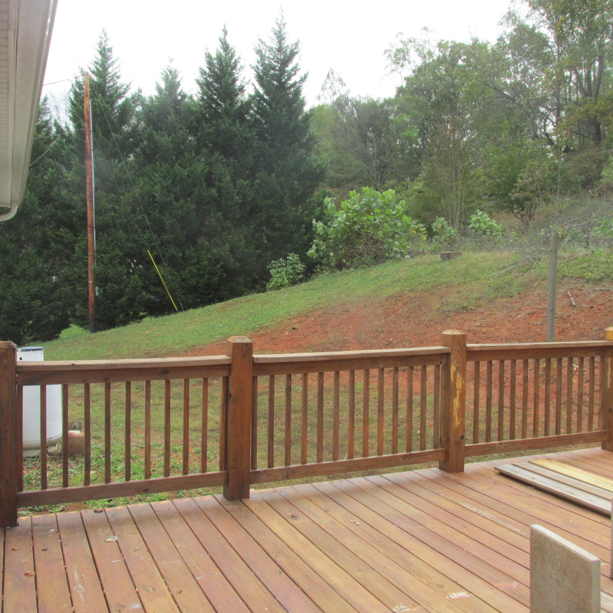 2643 Rutrough Road Southeast Roanoke, VA 24014 - Photo 23 of 32 a balcony with wooden floor and fence