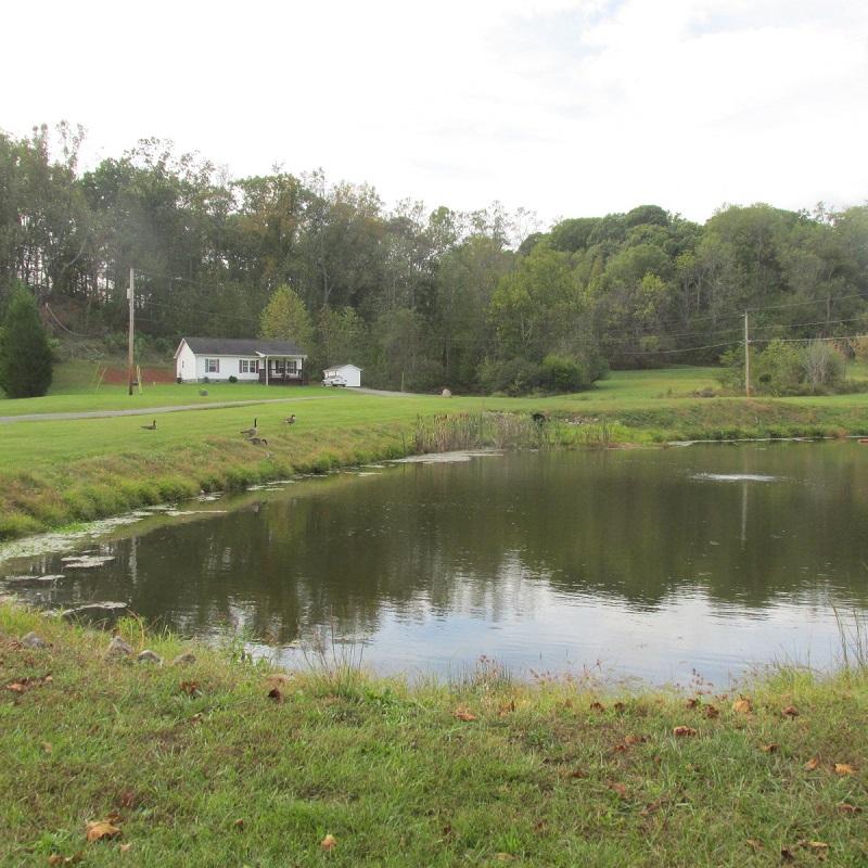 2643 Rutrough Road Southeast Roanoke, VA 24014 - Photo 4 of 32 a view of a lake in middle of the town