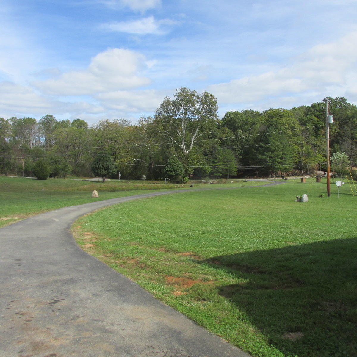 2643 Rutrough Road Southeast Roanoke, VA 24014 - Photo 32 of 32 a view of a golf course with a lake