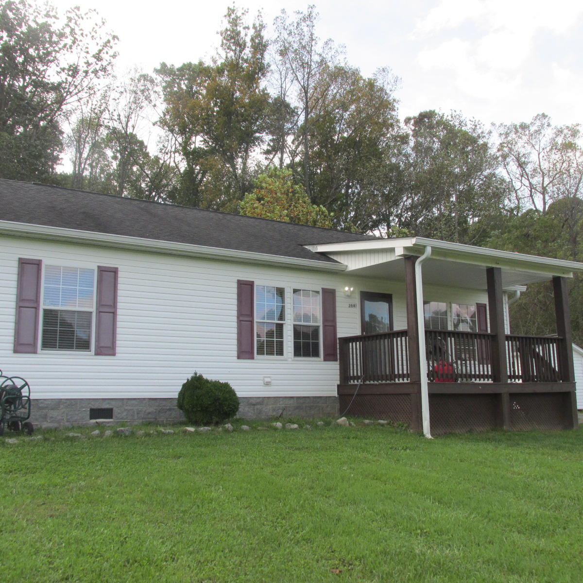 2643 Rutrough Road Southeast Roanoke, VA 24014 - Photo 8 of 32 front view of a house with a yard