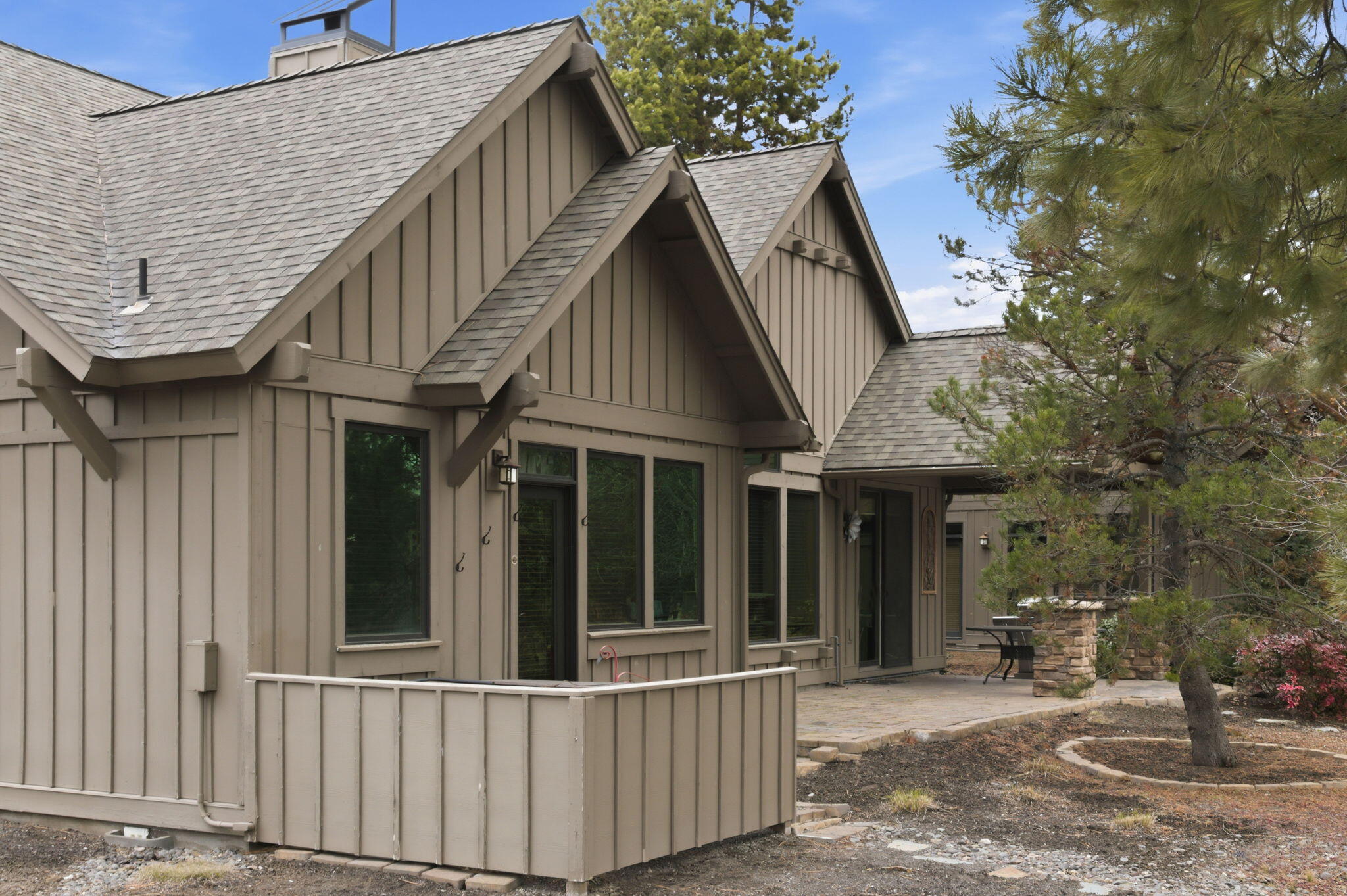 56508 Dancing Rock Loop, Unit 22 Bend, OR 97707 - Photo 42 of 69 a view of a house with a porch