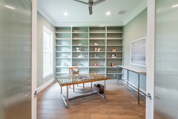 a view of a workspace with furniture