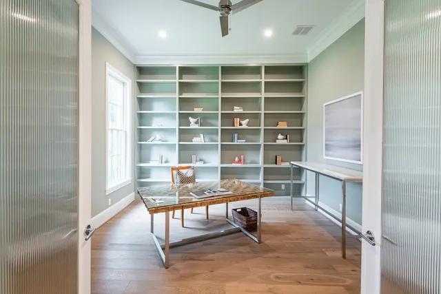 a view of a workspace with furniture