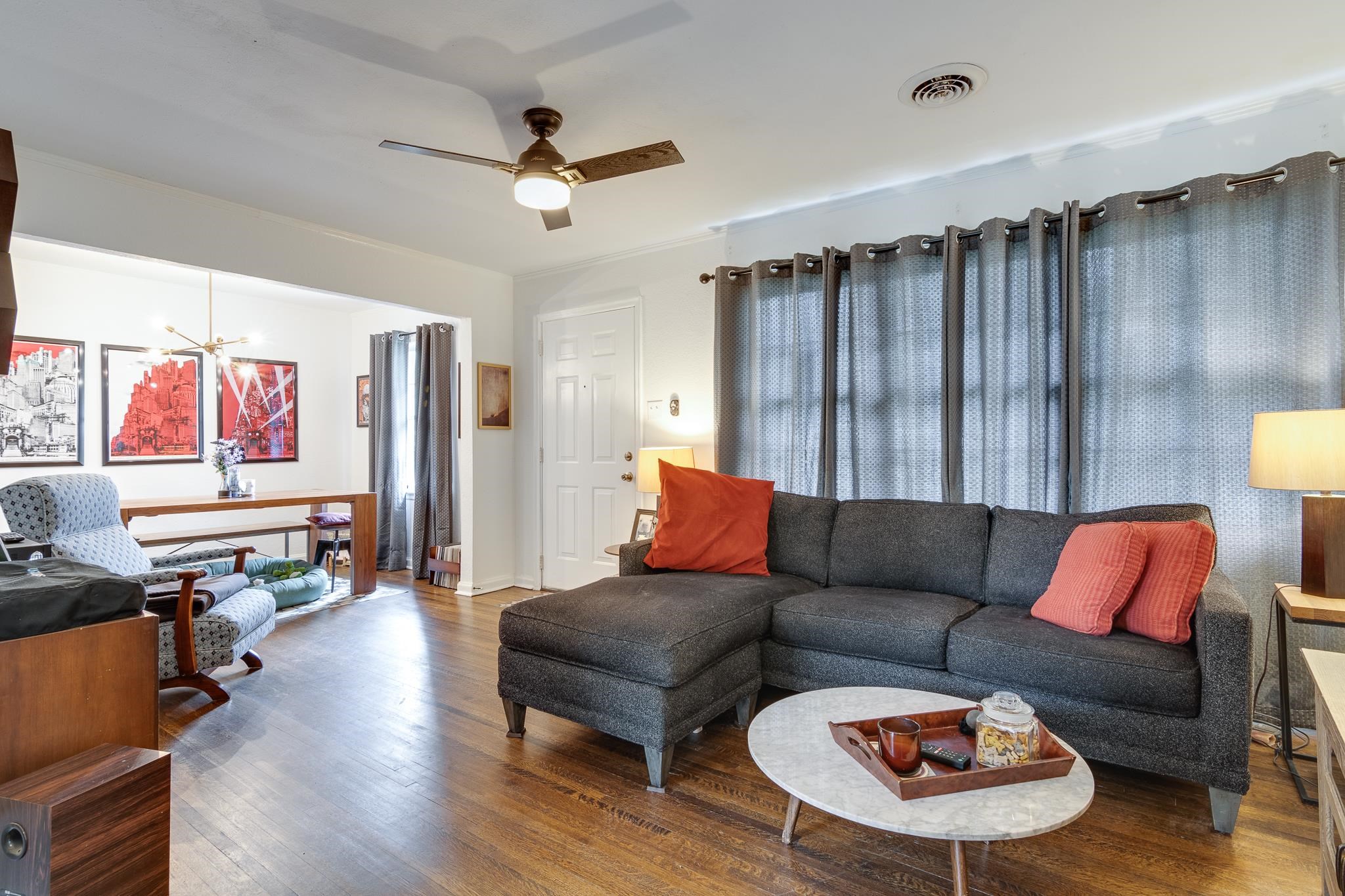 4488 Quince Road Memphis, TN 38117 - Photo 3 of 14 a living room with furniture and a wooden floor