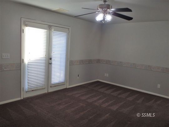 421 Marlene Court Ridgecrest, CA 93555 - Photo 21 of 50 an empty room with a window