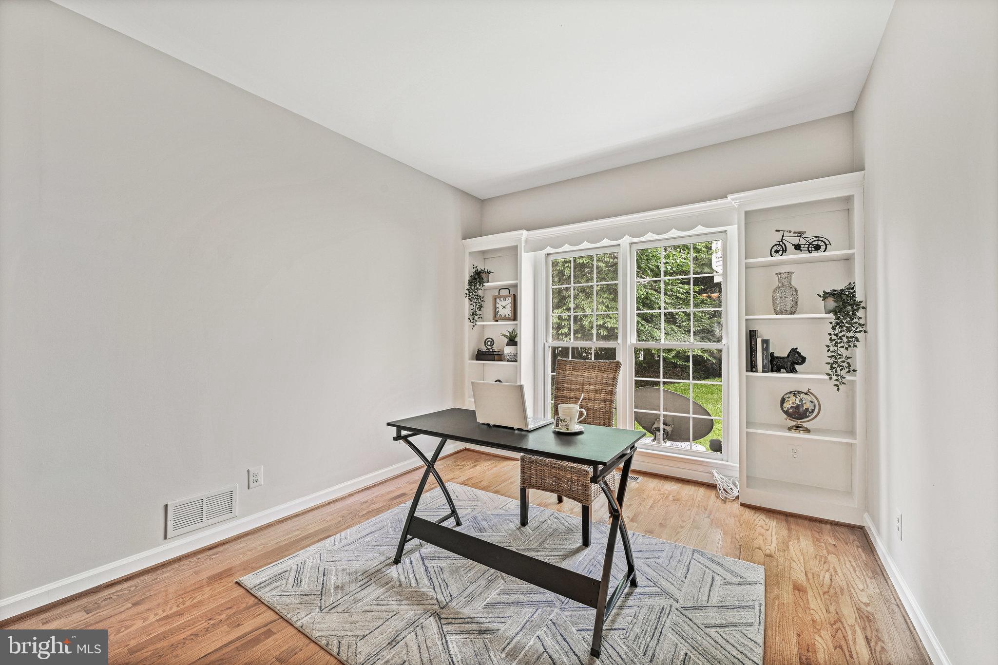 9700 Hidden Valley Road Vienna, VA 22181 - Photo 7 of 36 French doors open to main floor office w/built-ins