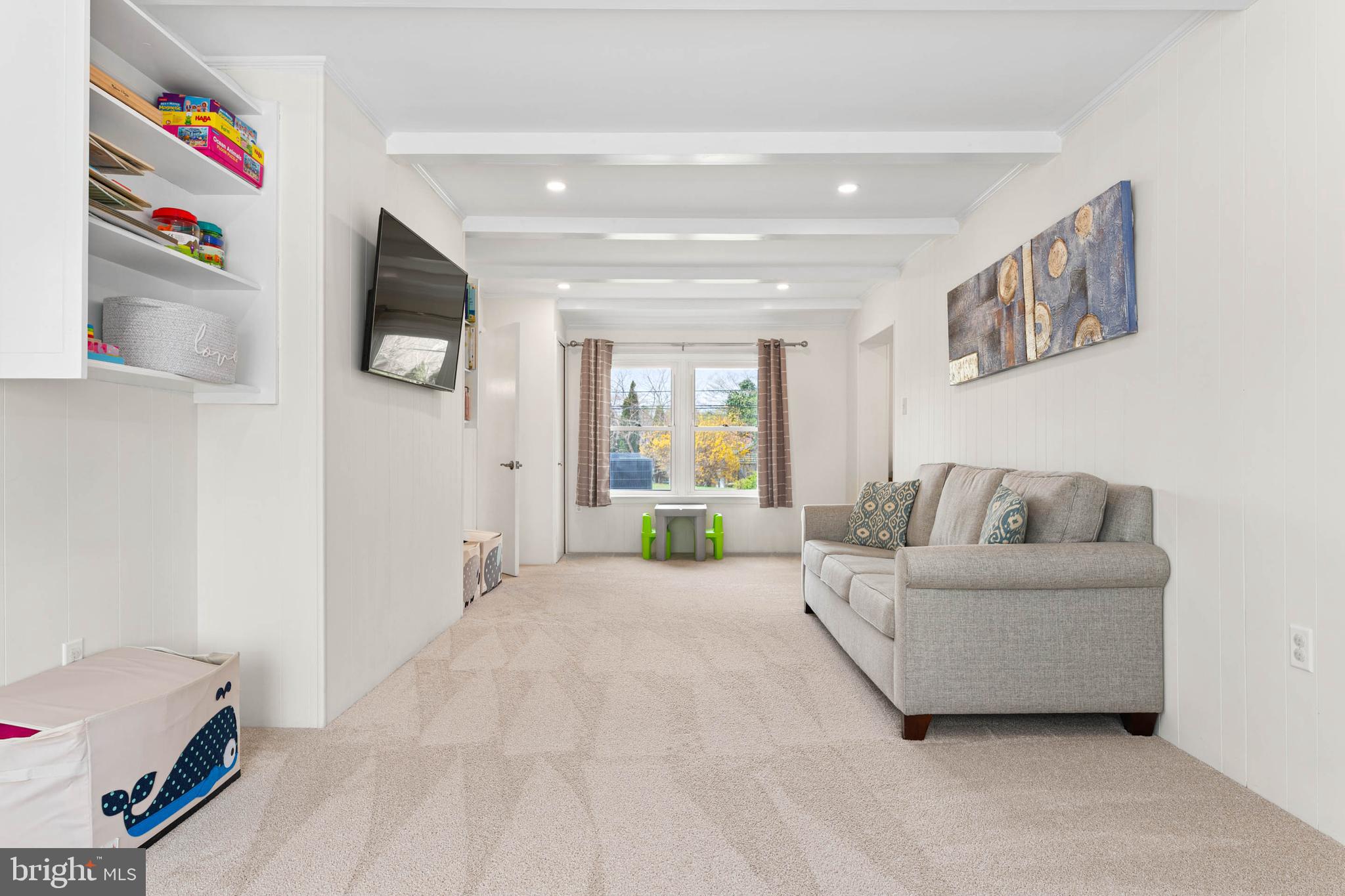 136 Ashley Road Newtown Square, PA 19073 - Photo 12 of 29 a living room with furniture and a flat screen tv