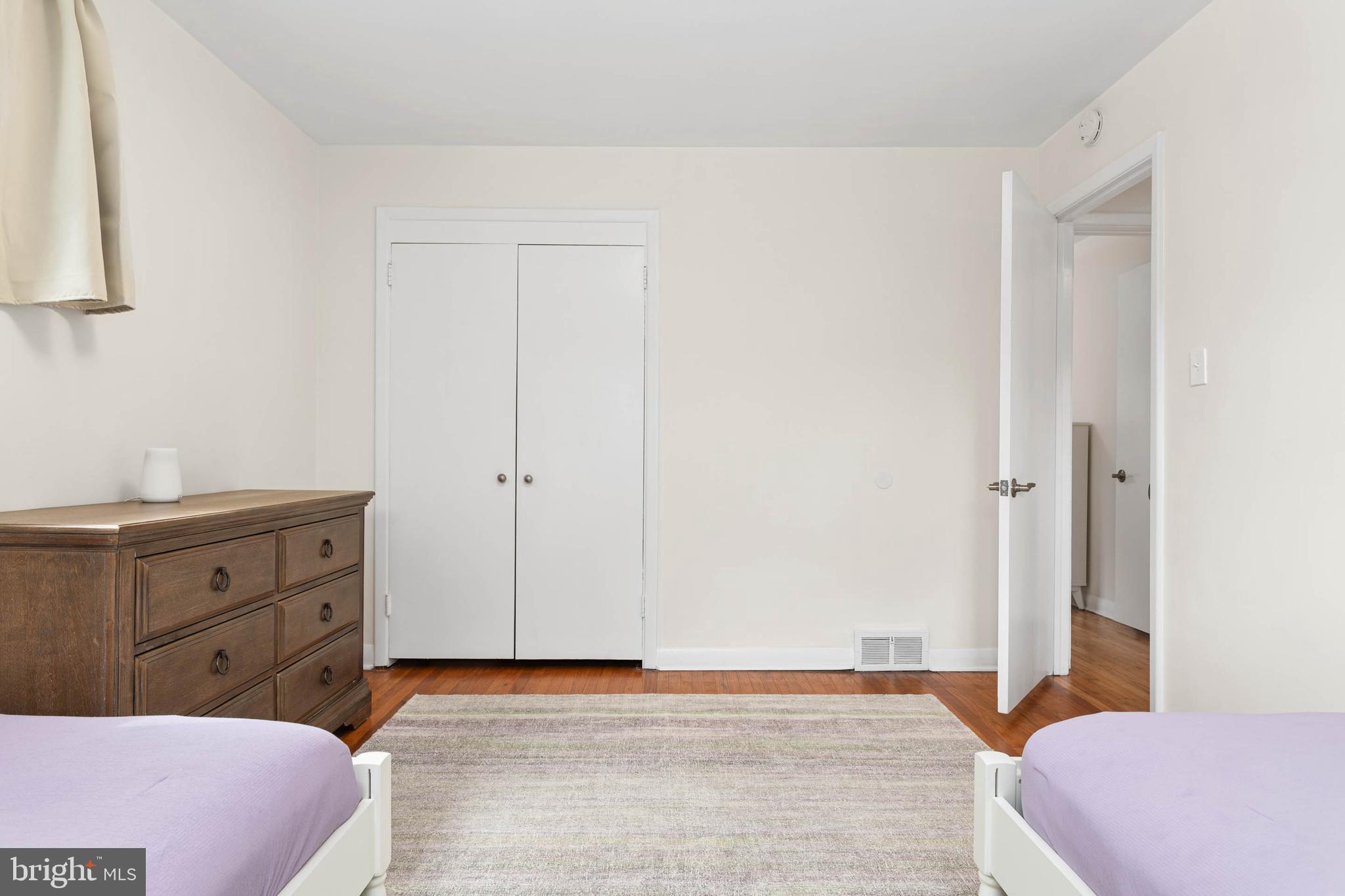 136 Ashley Road Newtown Square, PA 19073 - Photo 21 of 29 a bedroom with a bed and a dresser