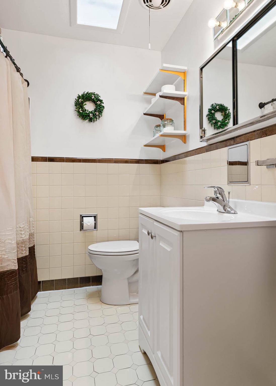 136 Ashley Road Newtown Square, PA 19073 - Photo 23 of 29 a bathroom with a sink a toilet and mirror