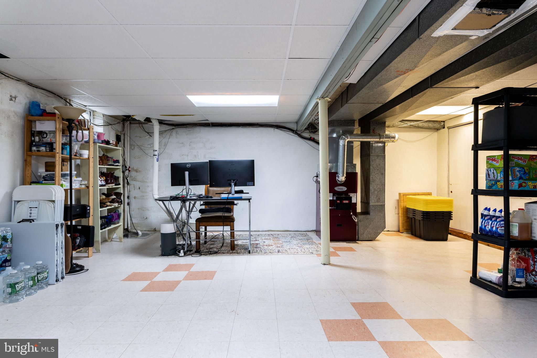 136 Ashley Road Newtown Square, PA 19073 - Photo 24 of 29 a view of a livingroom with furniture and a flat screen tv