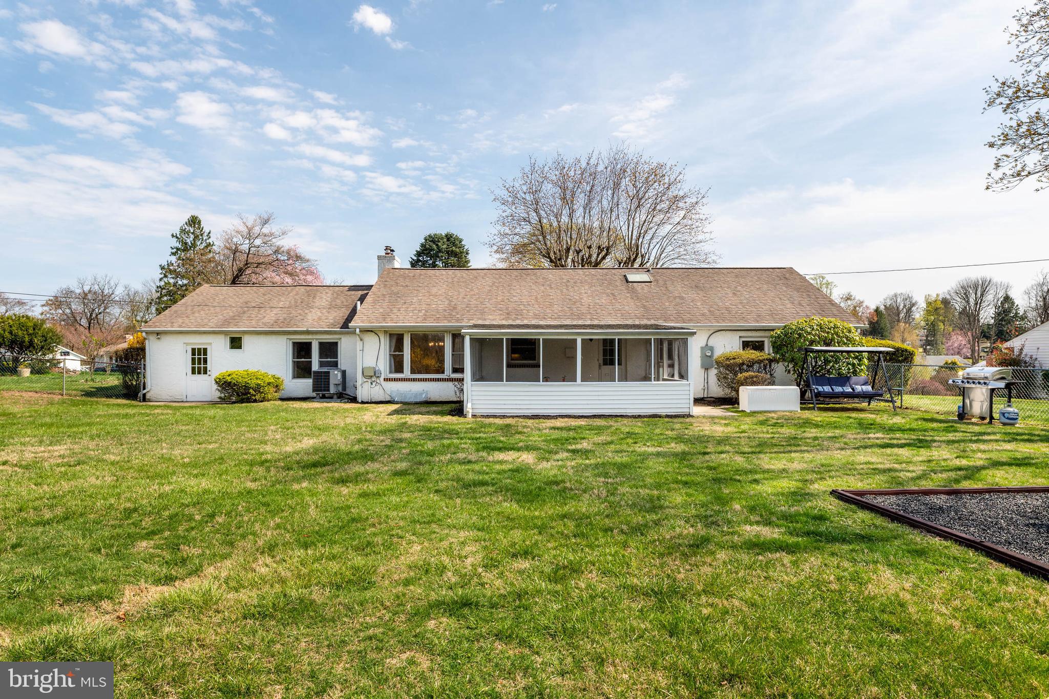 136 Ashley Road Newtown Square, PA 19073 - Photo 27 of 29 a front view of a house with a garden