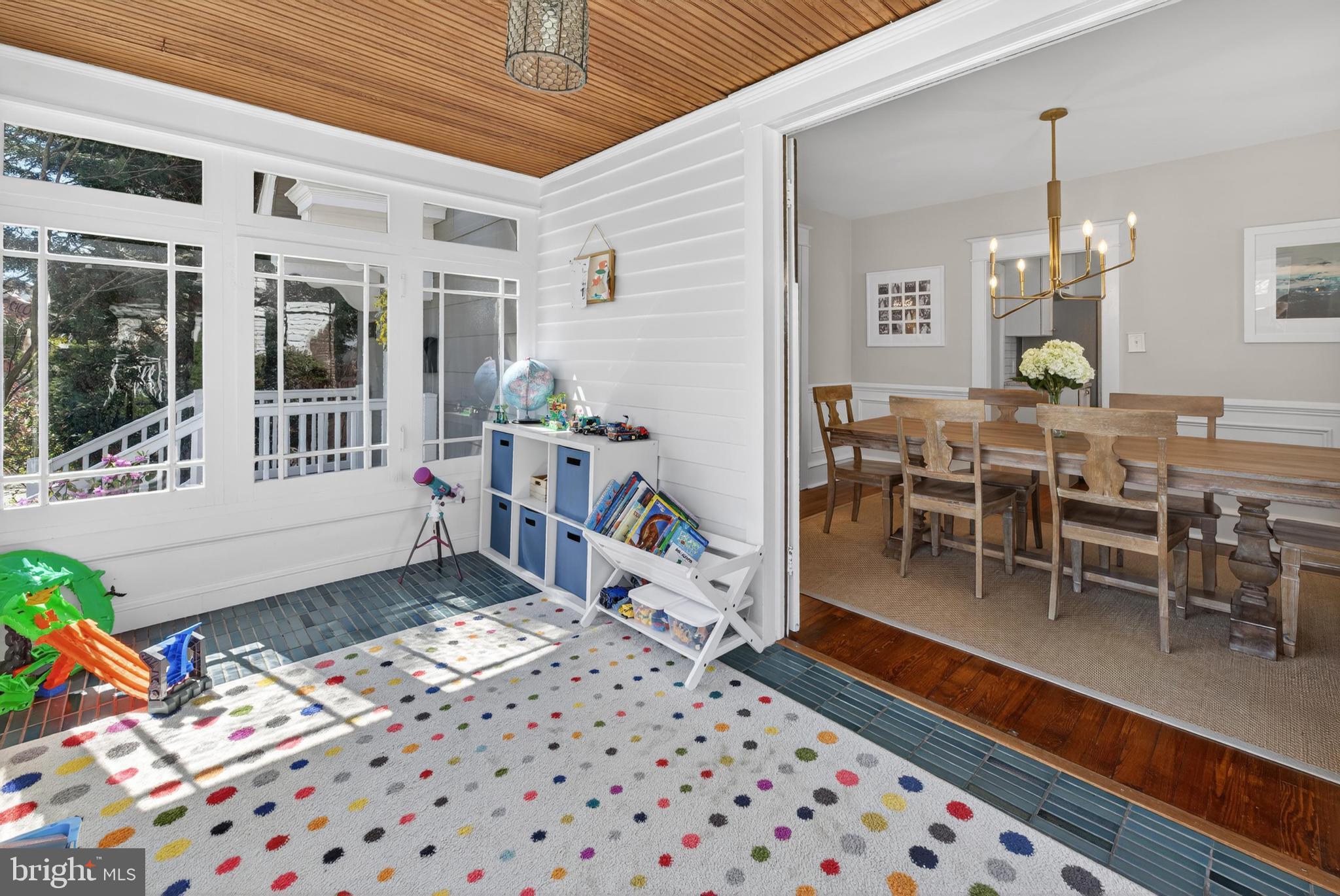 812 Princeton Avenue Haddonfield, NJ 08033 - Photo 12 of 30 a room with furniture a chandelier and a window