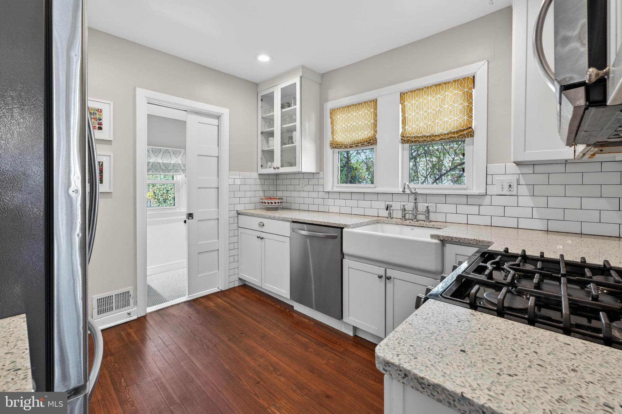 812 Princeton Avenue Haddonfield, NJ 08033 - Photo 13 of 30 a kitchen with a sink stove and refrigerator