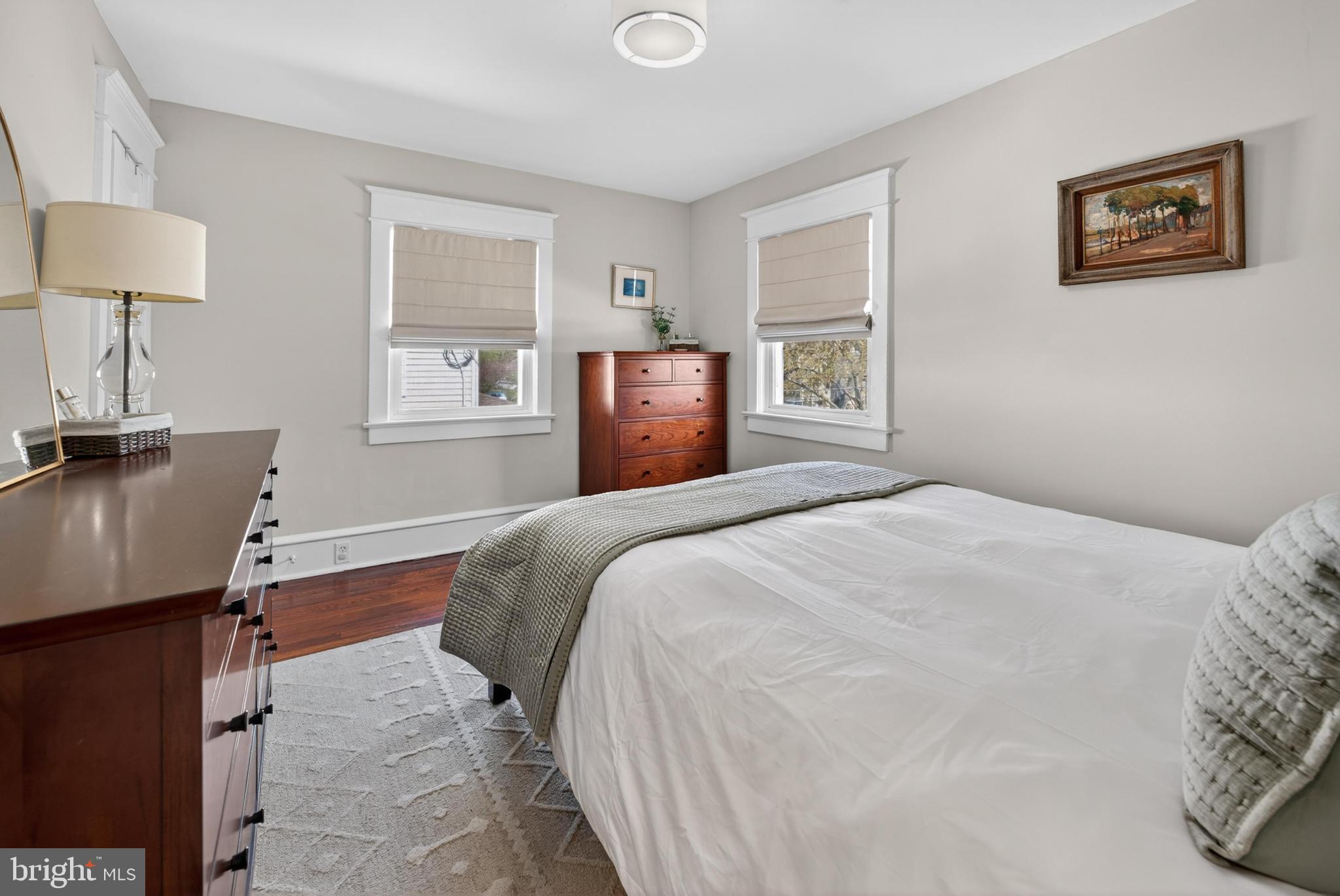 812 Princeton Avenue Haddonfield, NJ 08033 - Photo 18 of 30 a bedroom with a bed and a lamp on table