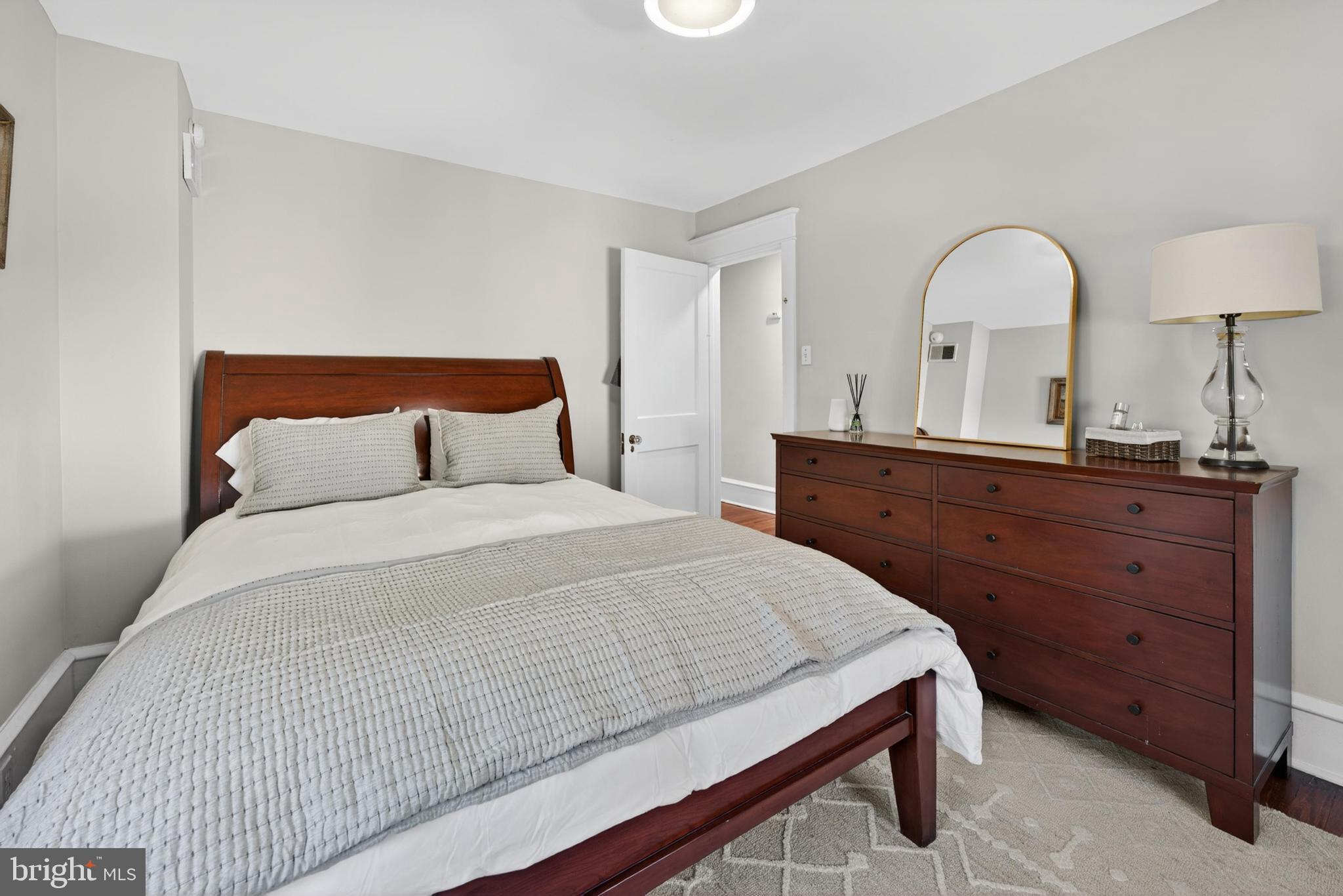 812 Princeton Avenue Haddonfield, NJ 08033 - Photo 19 of 30 a bedroom with a bed and a dresser