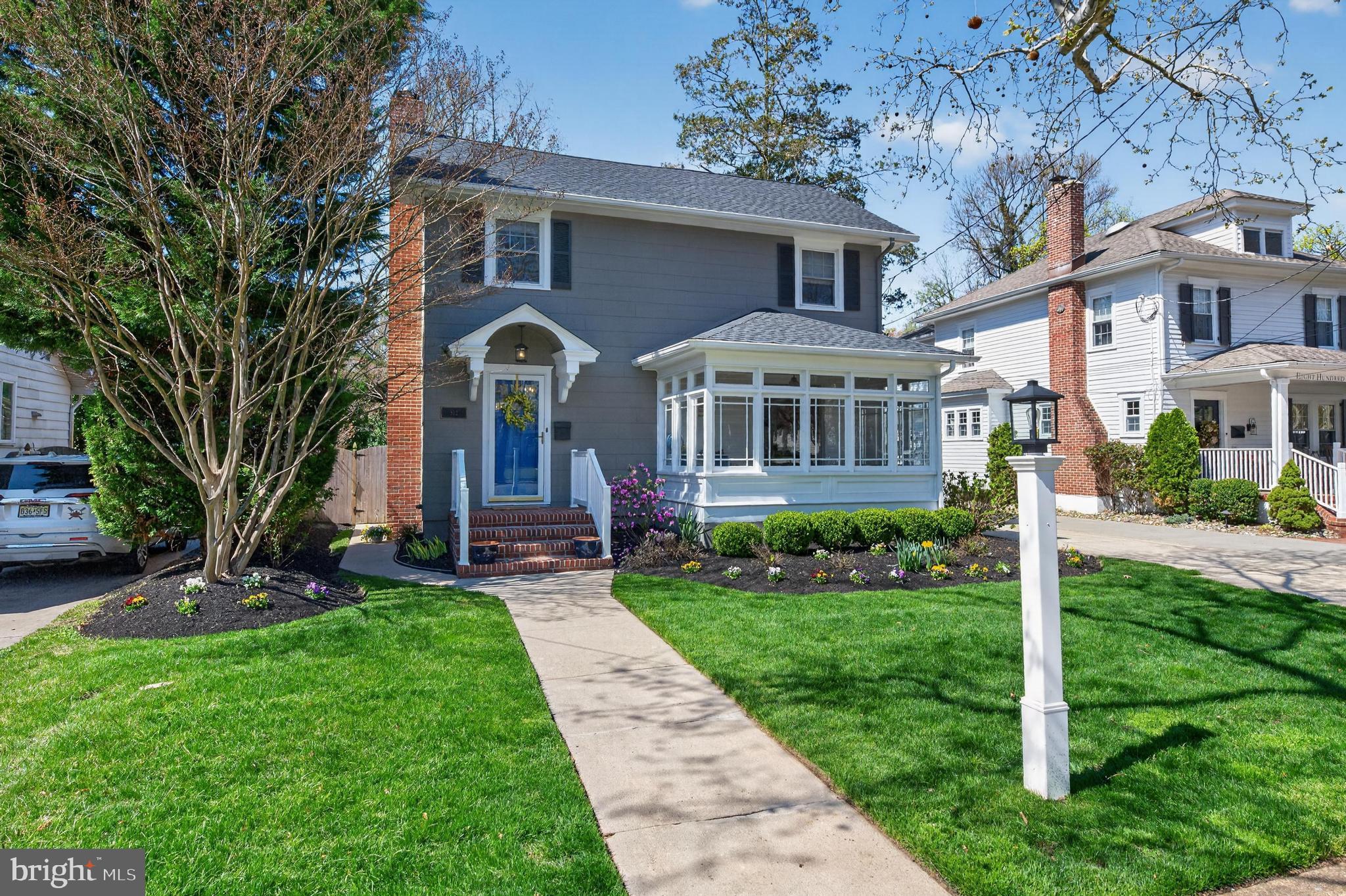 812 Princeton Avenue Haddonfield, NJ 08033 - Photo 2 of 30 a front view of a house with a yard