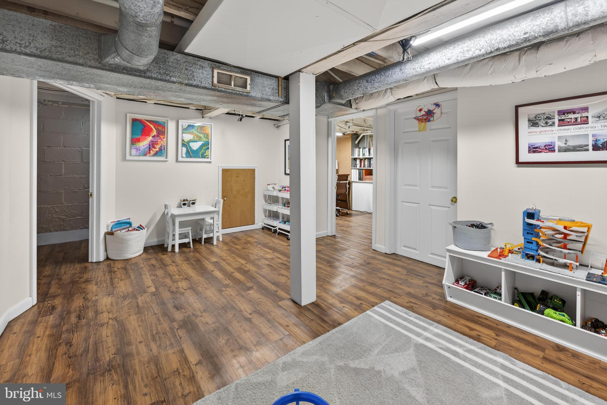 812 Princeton Avenue Haddonfield, NJ 08033 - Photo 25 of 30 a view of a hallway with wooden floor and furniture