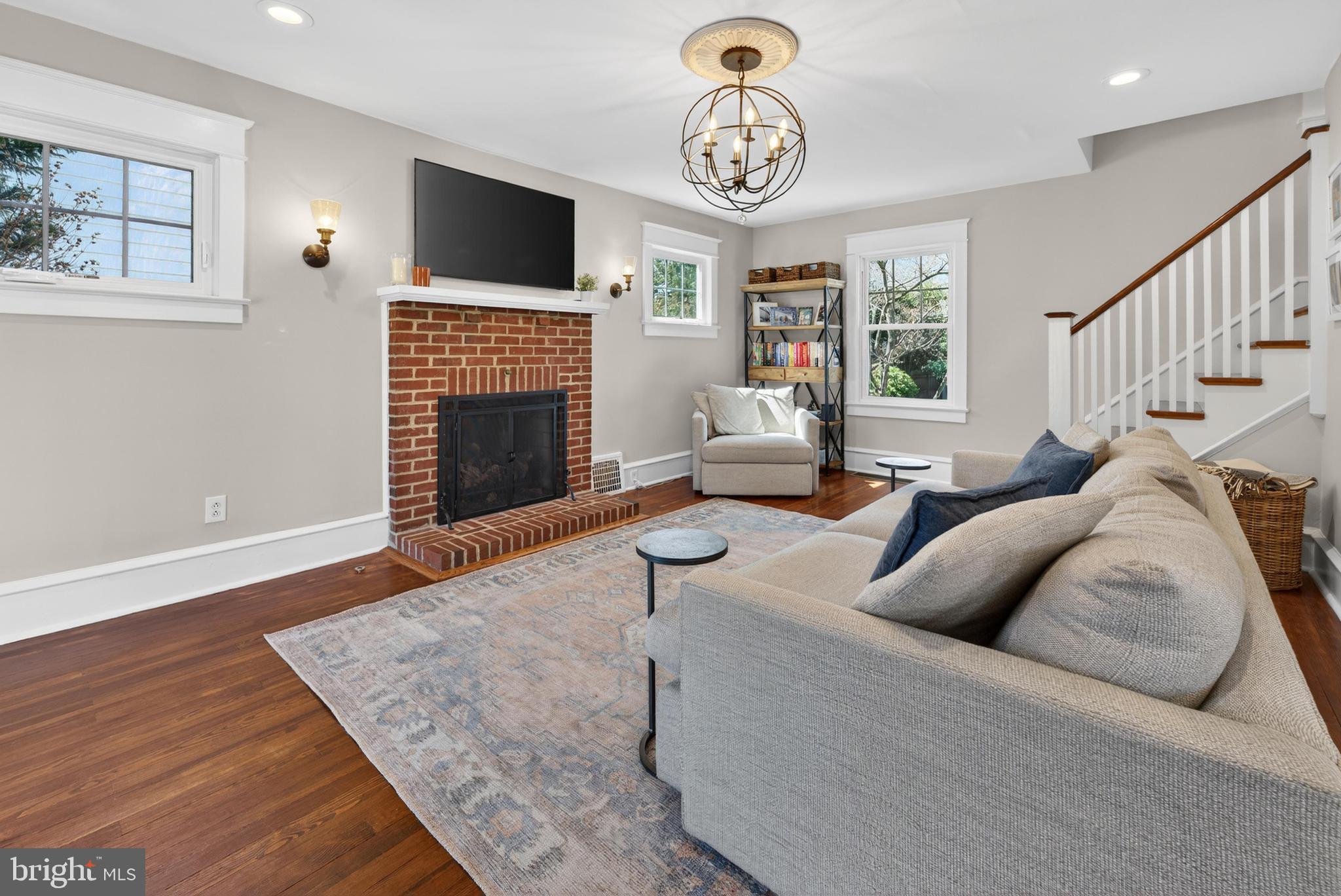 812 Princeton Avenue Haddonfield, NJ 08033 - Photo 4 of 30 a living room with furniture and a fireplace