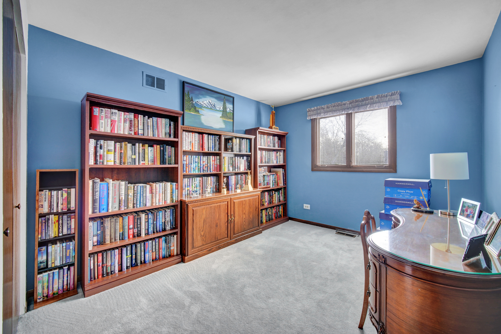 900 St Andrews Way Frankfort, IL 60423 - Photo 18 of 22 a room with furniture and book shelf
