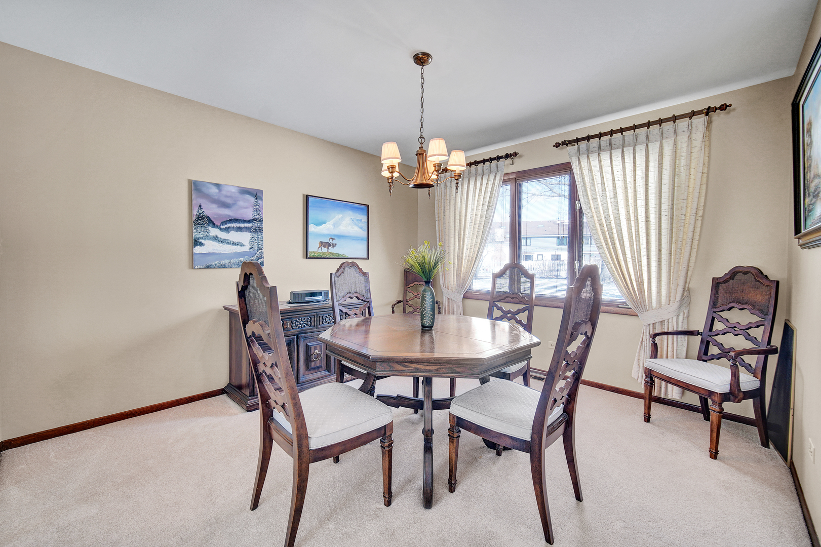 900 St Andrews Way Frankfort, IL 60423 - Photo 8 of 22 a view of a dining room with furniture window and outside view