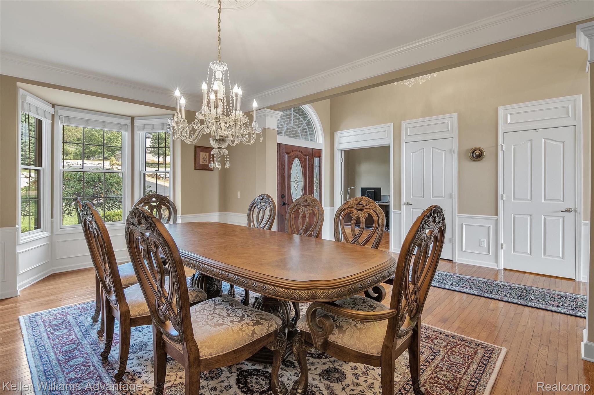 9042 Ridgefield Drive Brighton, MI 48114 - Photo 45 of 61 Elegant dining room with attached built in granite counter bar area great for food preparation