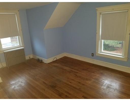 475 Reed Road Dartmouth, MA 02747 - Photo 12 of 21 a view of an empty room with wooden floor and a window
