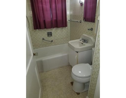 475 Reed Road Dartmouth, MA 02747 - Photo 10 of 21 a bathroom with a toilet a sink and bathtub