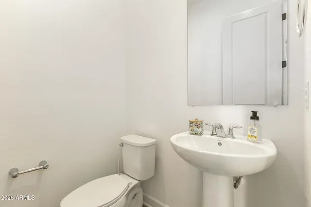 a bed room with a bed and a tv