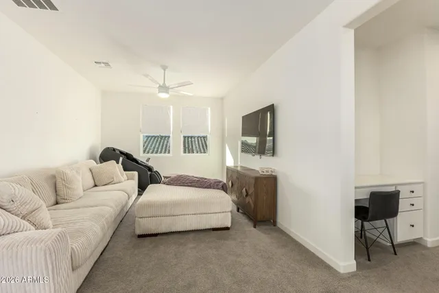 a bedroom with bed and a window