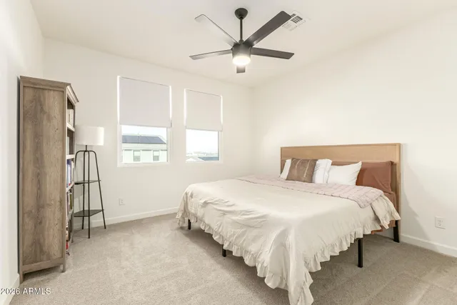 a bathroom with a bathtub and a window
