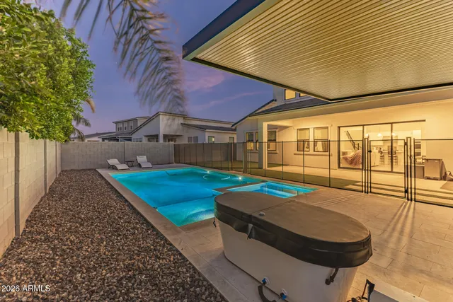 a view of a house with swimming pool