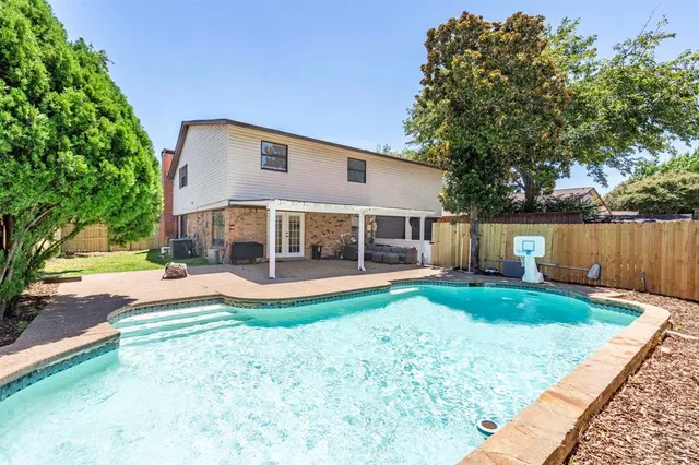 a view of a backyard with garage
