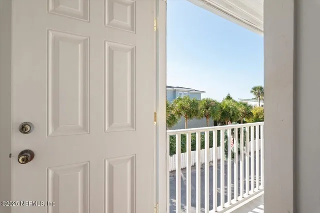 a view of a porch with a yard