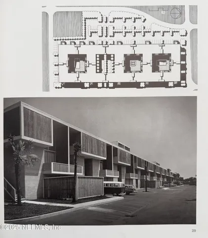 a view of kitchen with kitchen island and appliances